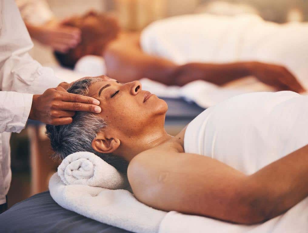 Woman getting a massage on her temples